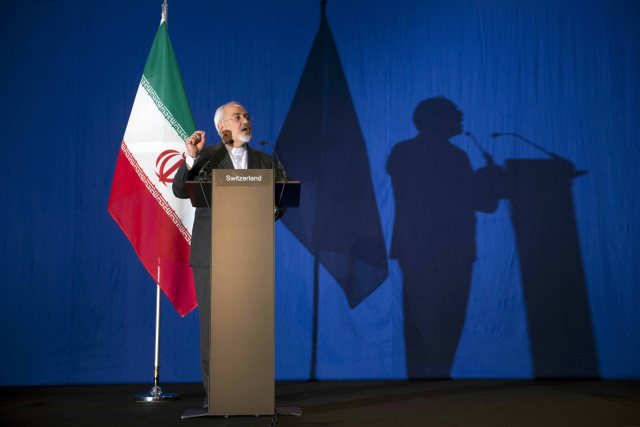 Iran's Foreign Minister Javad Zarif gestures as he speaks during a news conference at the Swiss Federal Institute of Technology in Lausanne (Ecole Polytechnique Federale De Lausanne) on April 2, 2015, after Iran nuclear program talks finished with extended sessions. Iran and world powers reached a framework agreement on Thursday on curbing Iran's nuclear programme for at least a decade after eight days of marathon talks in Switzerland. The tentative agreement clears the way for talks on a future comprehensive settlement that should allay Western fears that Iran was seeking to build an atomic bomb and in return lift economic sanctions on the Islamic Republic.  REUTERS/Brendan Smialowski/Pool  - RTR4VXH0